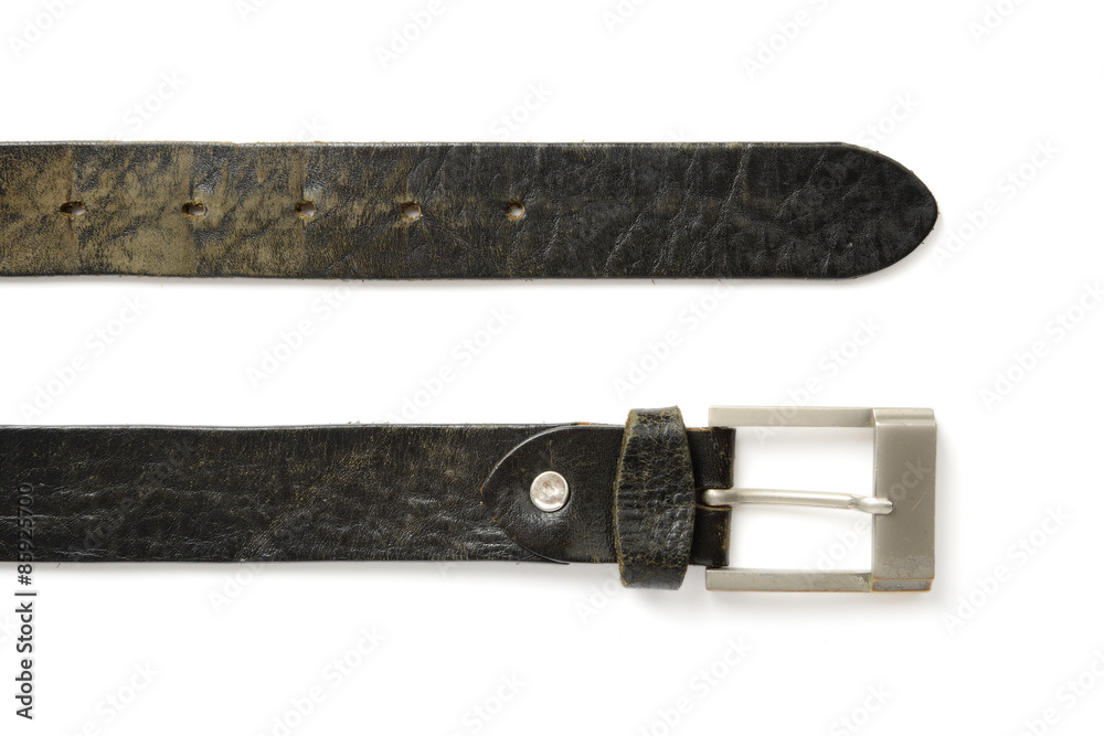 Detail of Black colored old belt and buckle Detail of Black colored old belt and buckle