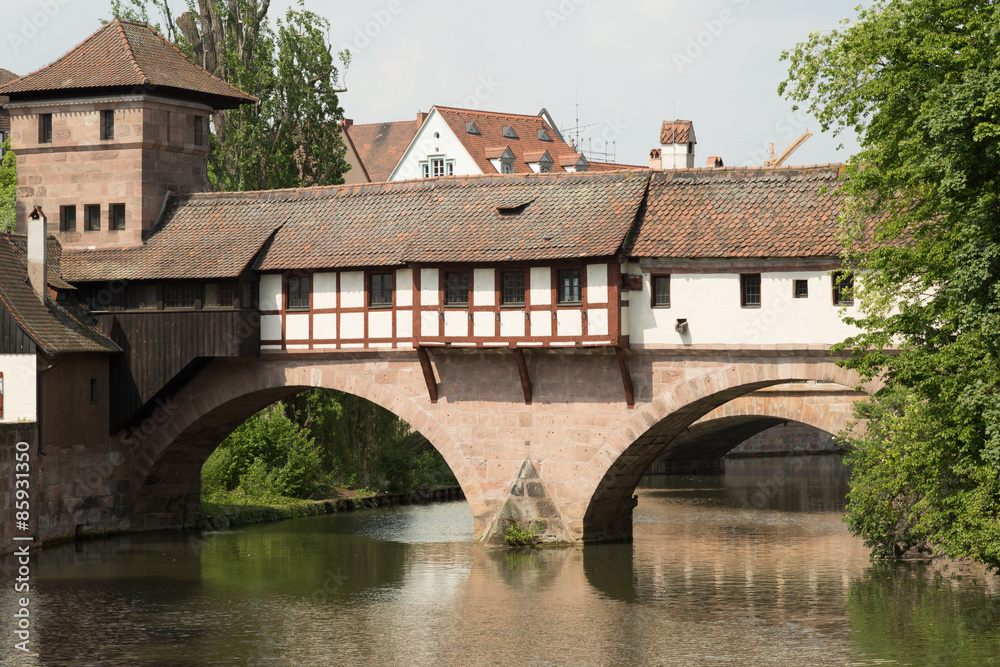 the wooden Henkersteg pedestrian bridge on the river Pegnitz in Nuremberg, Germany