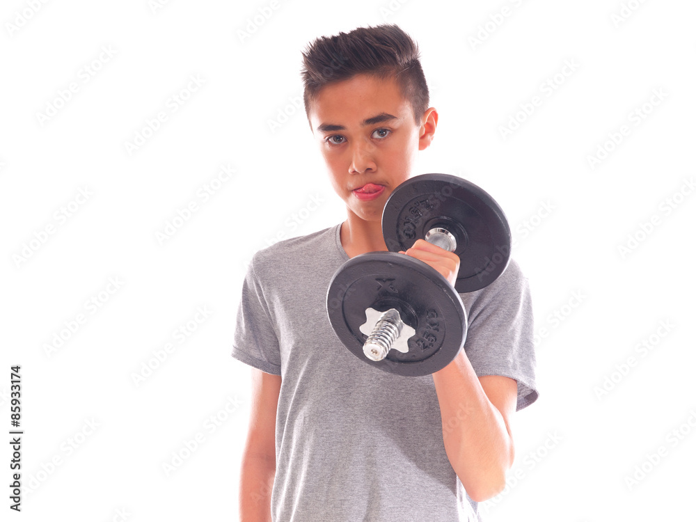 teenage boy exercising with a dumbbell teenage boy exercising with a dumbbell