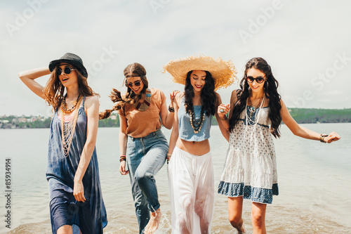 four beautiful girls on the beach