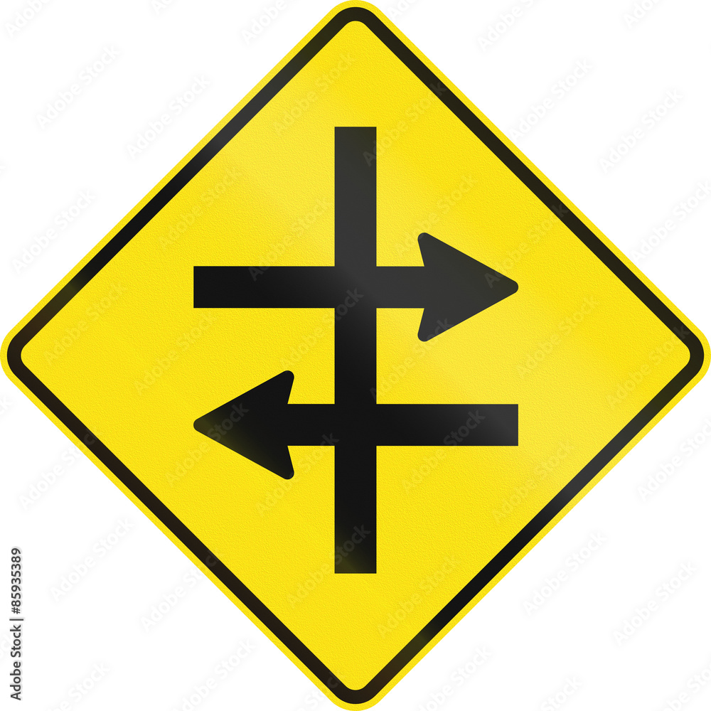An Australian warning traffic sign - Intersection at dual carriageway An Australian warning traffic sign - Intersection at dual carriageway