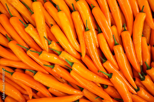 Orange peppers background
