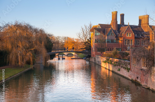 CAMBRIDGE, UK - JANUARY 18, 2015: River Cam and tourist's boats at sunset  photo