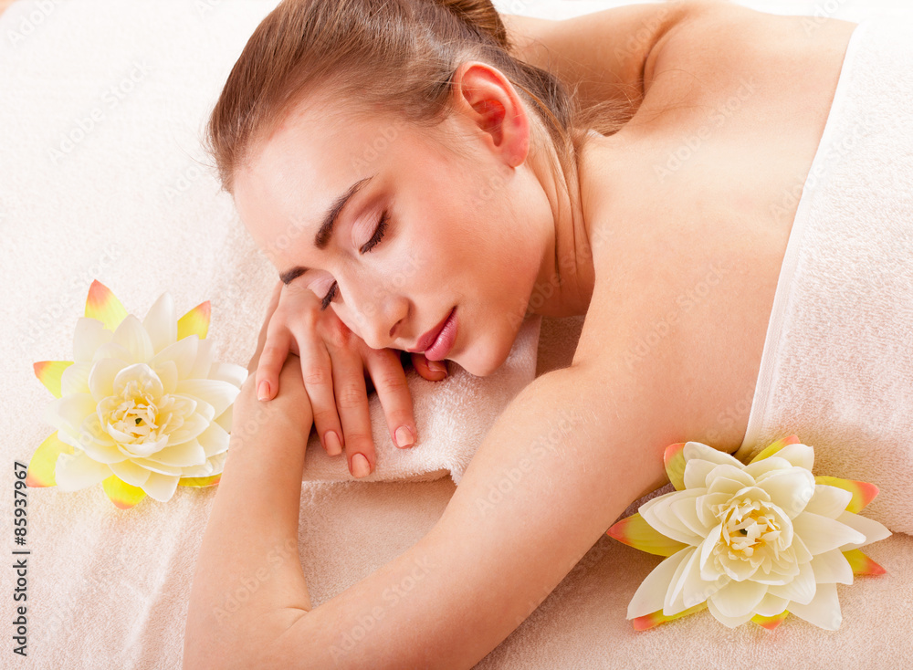 Beautiful young woman getting spa massage Beautiful young woman getting spa massage