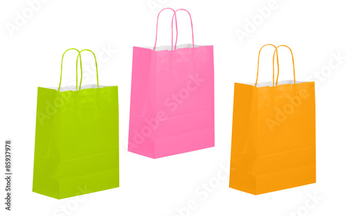 Pink green and orange colour paper carrier bags, shoppers, isolated
