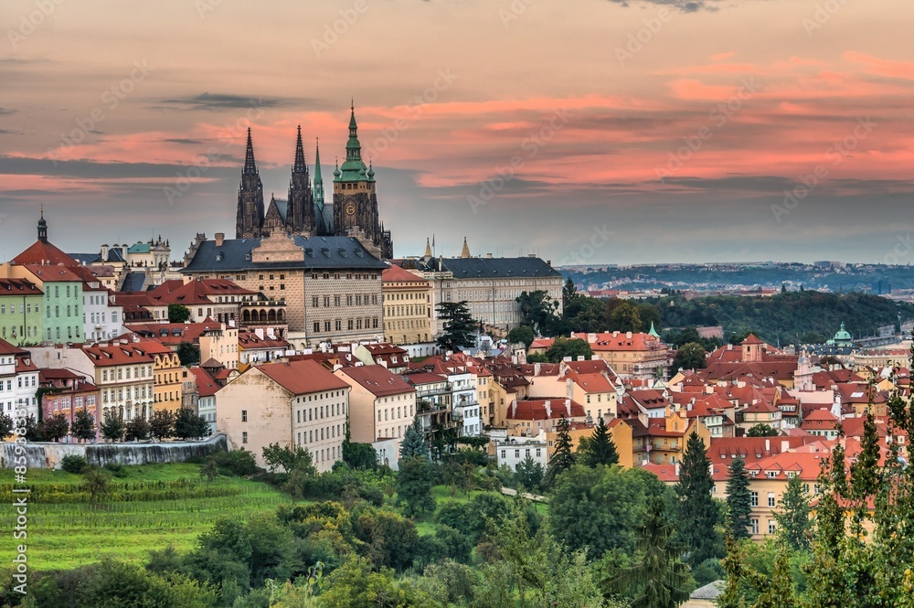 Prague castle and roofs of buildings in Prague during sunset