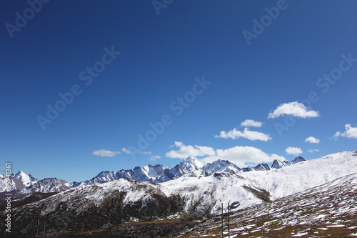Snowcapped mountain with clear skies