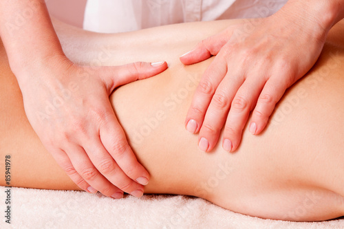 Beautiful young woman getting spa massage © missty