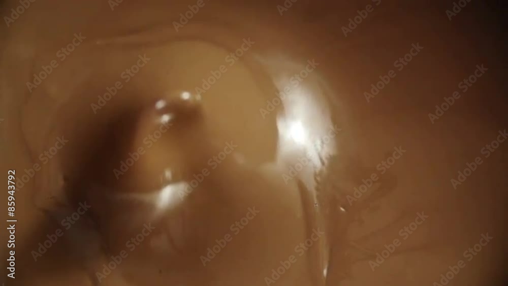Strawberries falling into melted chocolate. Shoot on Digital Cinema Camera in slow motion ProRes 422 codec. Strawberries falling into melted chocolate. Shoot on Digital Cinema Camera in slow motion ProRes 422 codec.