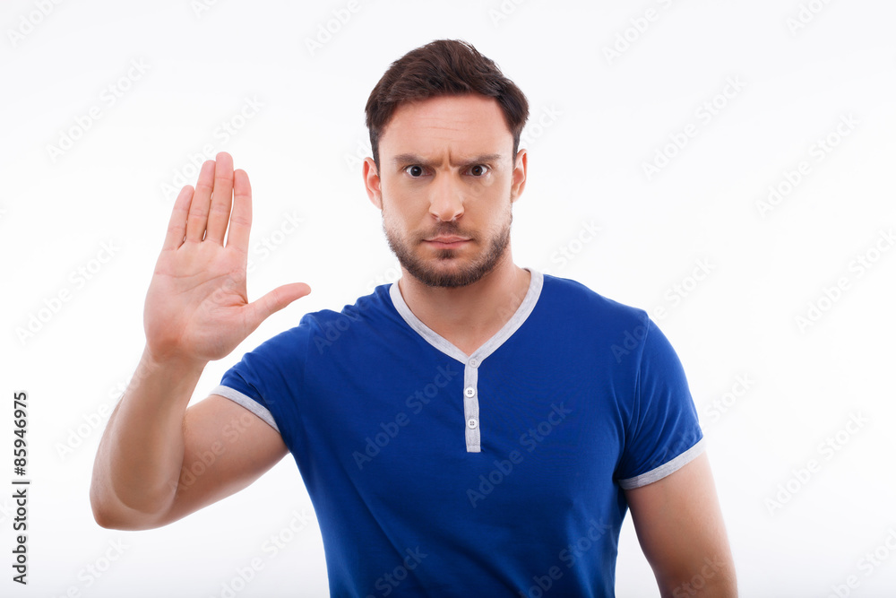 Handsome young man is refusing to do something Handsome young man is refusing to do something