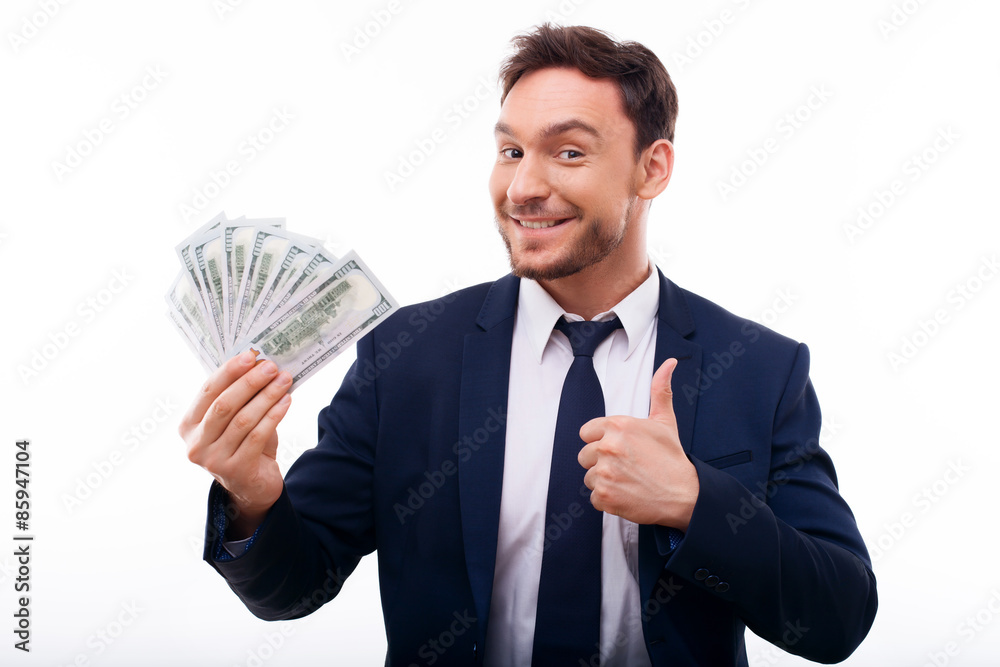 Handsome young man is happy and successful Handsome young man is happy and successful