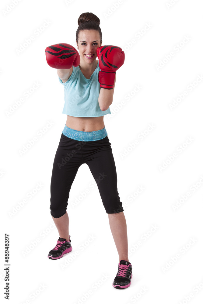 girl in gym wearing boxing gloves