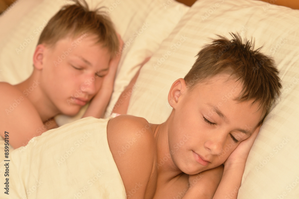 Brothers sleeping in bed Brothers sleeping in bed