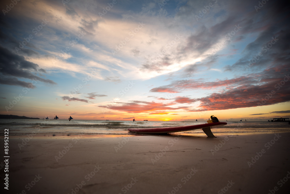 surfboard on a deserted beach