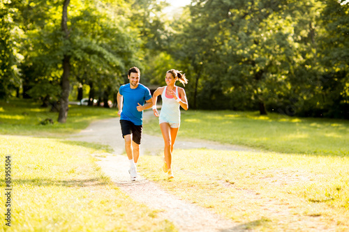 Young couple running