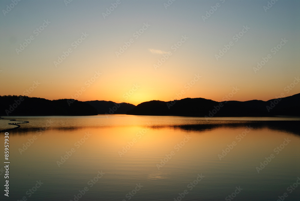 blue and orange gradation of sunset on the JINYANG lake blue and orange gradation of sunset on the JINYANG lake