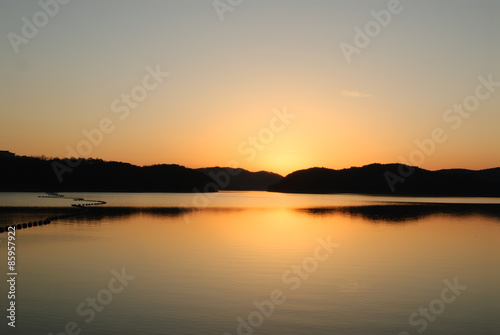 blue and orange gradation of sunset on the JINYANG lake