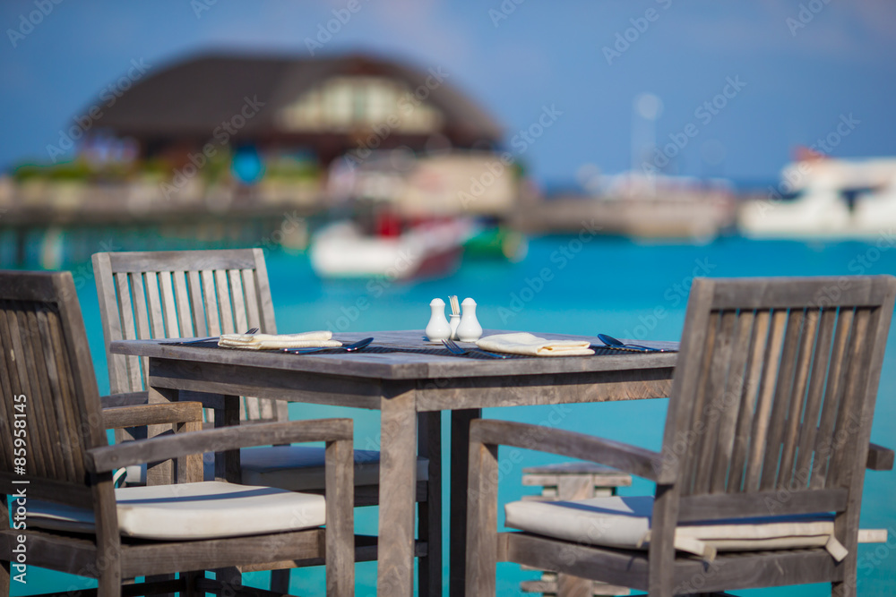 Fototapeta premium Summer empty outdoor cafe at exotic island in indian ocean