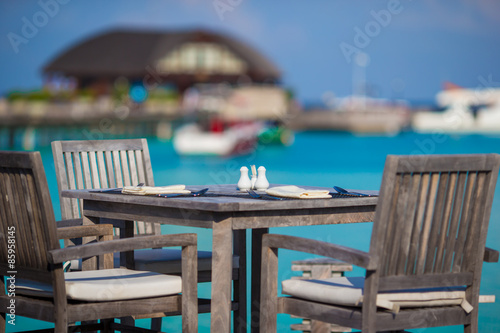 Summer empty outdoor cafe at exotic island in indian ocean