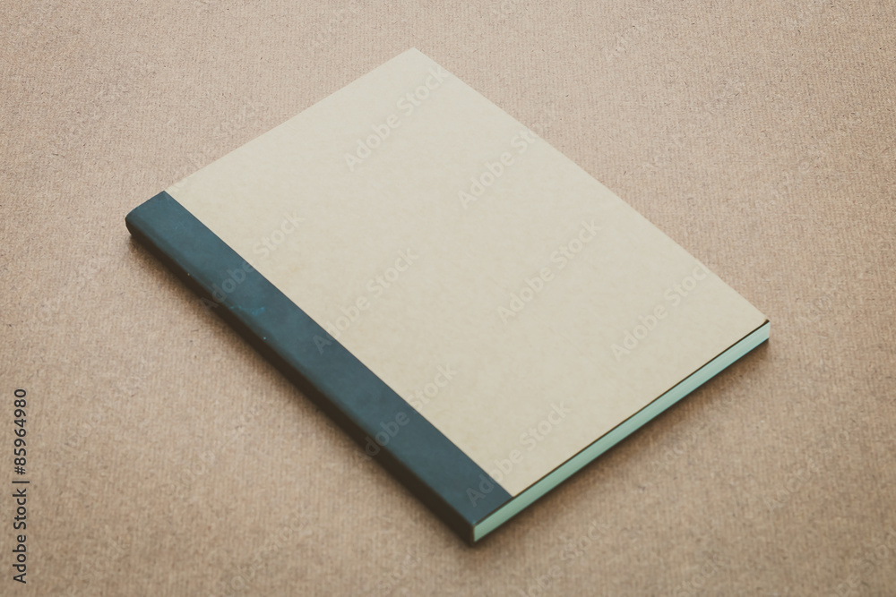Fototapeta premium Notebook mock up on wood background