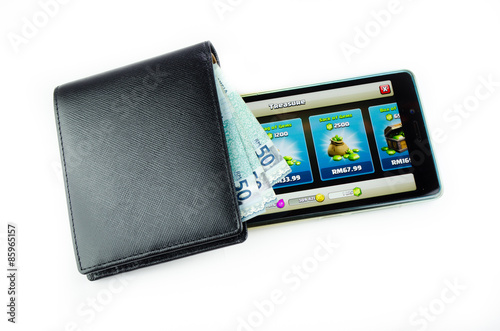 Money and phone isolated on white background