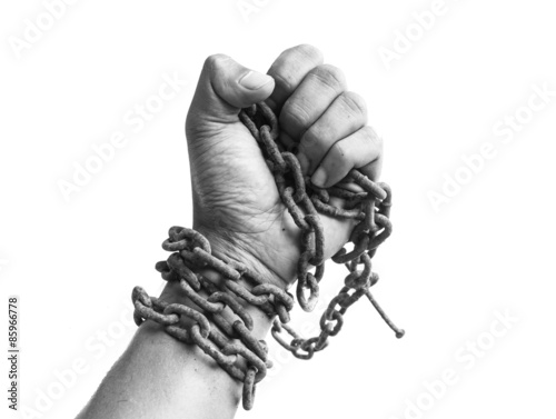 Male hand holding chain on white background