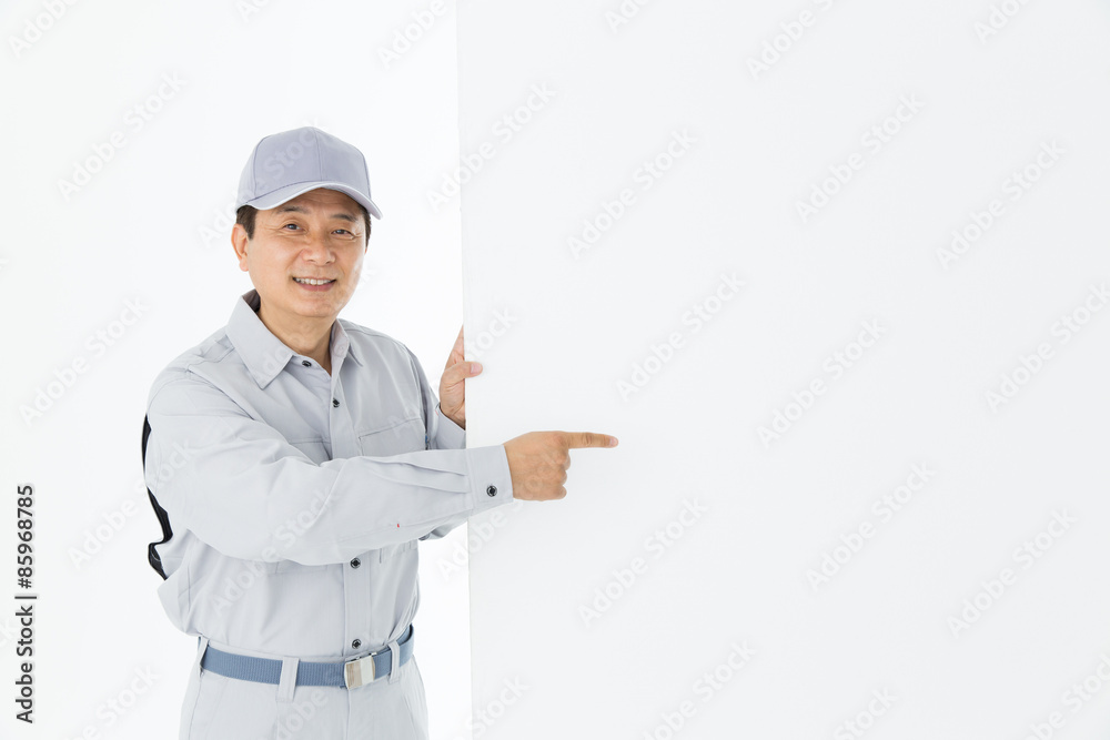 作業着を着た男性 作業着を着た男性
