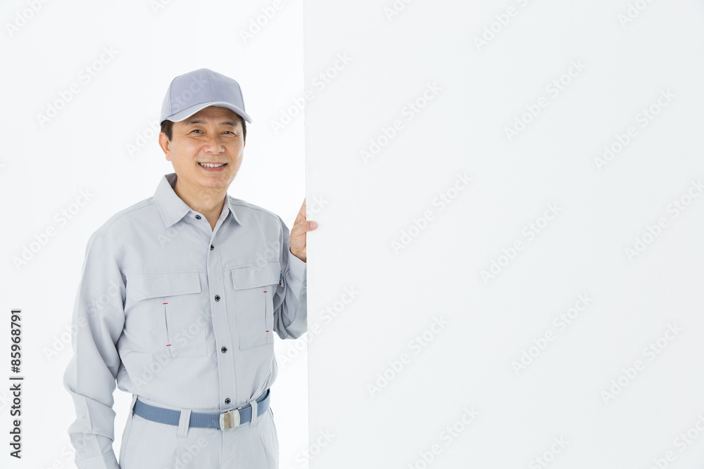 作業着を着た男性 作業着を着た男性