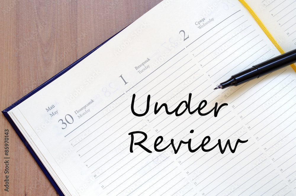 Under review concept Notepad Under review concept Notepad