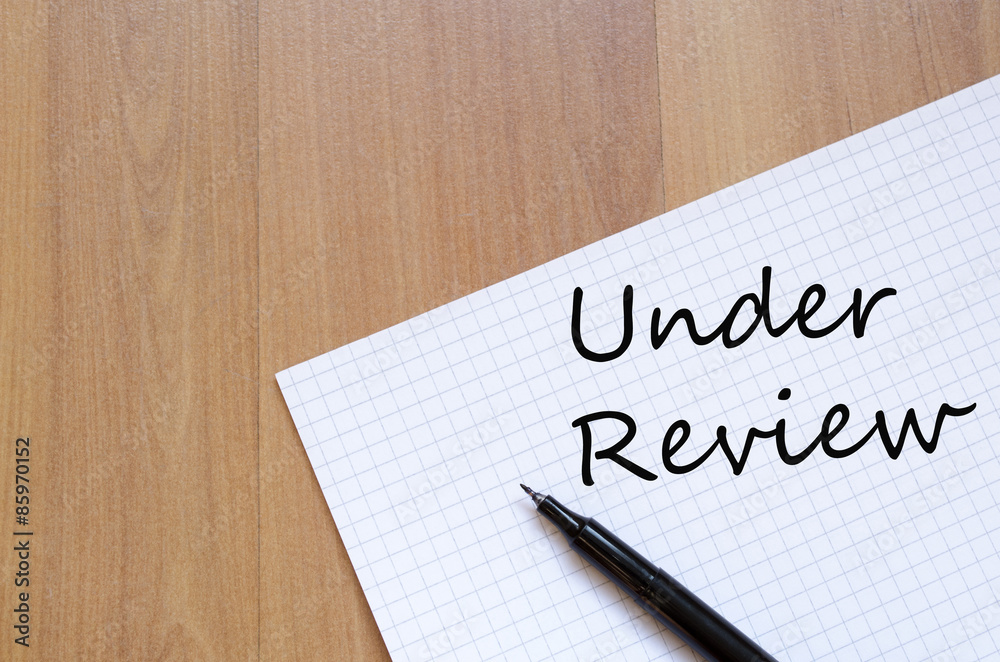 Under review concept Notepad Under review concept Notepad