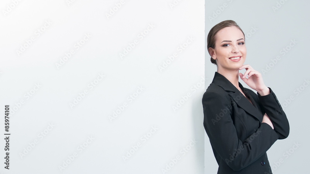 Beautiful lady smiling at white board Beautiful lady smiling at white board