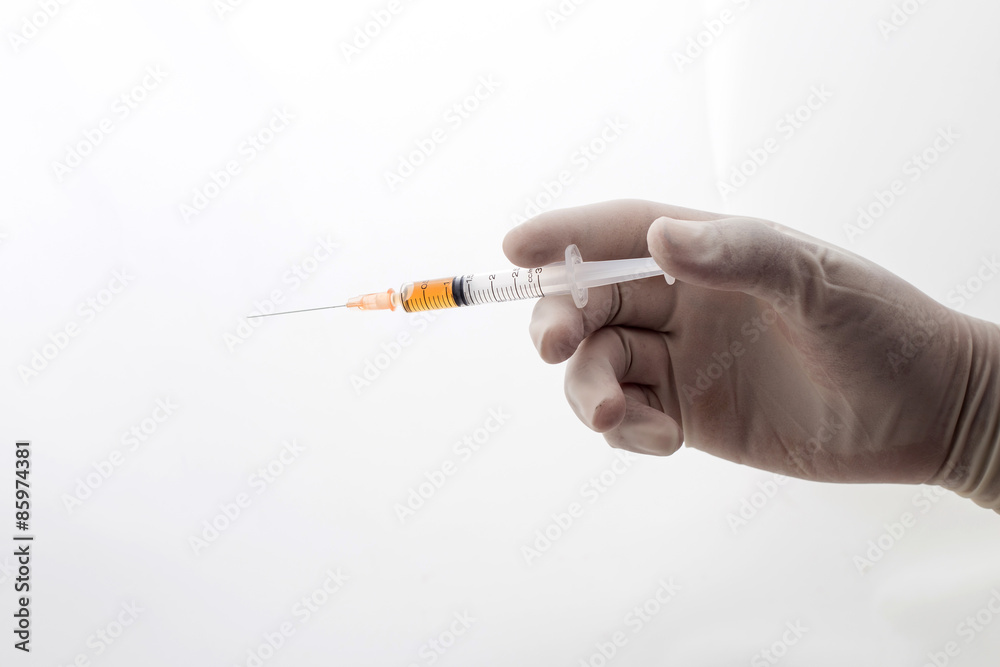 syringe closeup on white background syringe closeup on white background