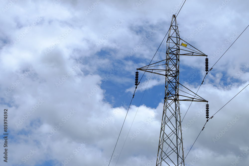 transmission tower and blue sky with clouds transmission tower and blue sky with clouds