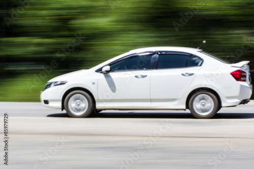 White car Speeding in road © prwstd