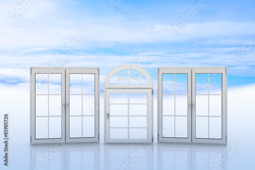 White windows with blue sky and clouds on the background