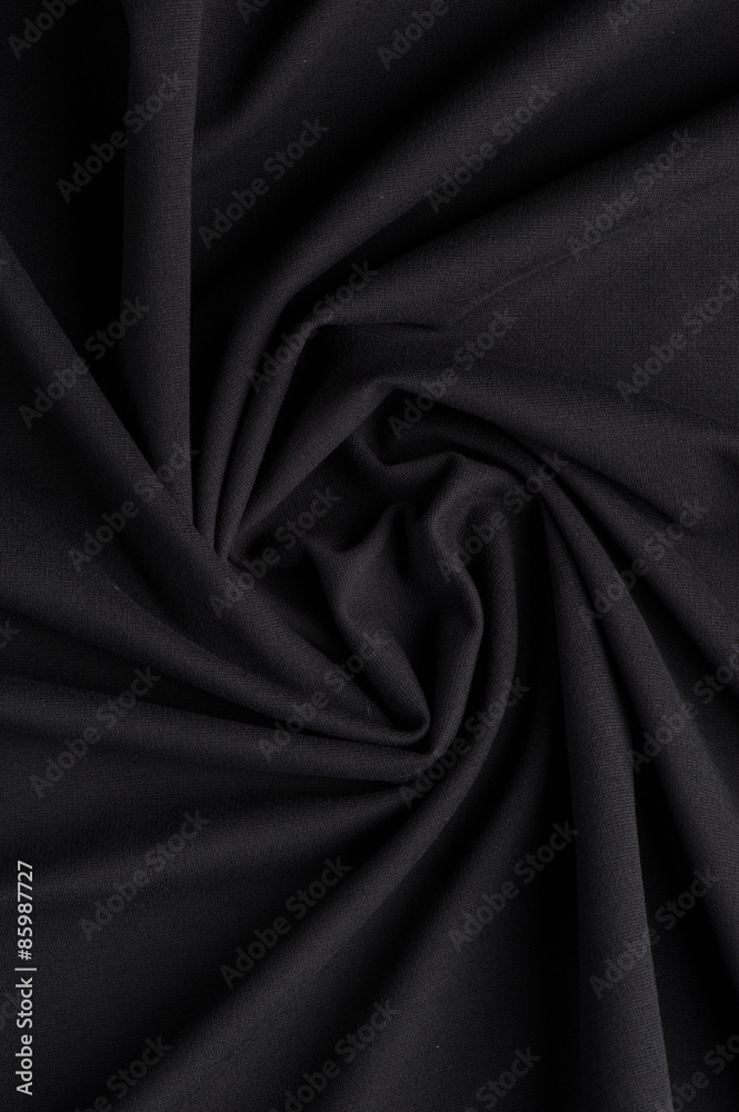Spiral folds on black cloth Spiral folds on black cloth