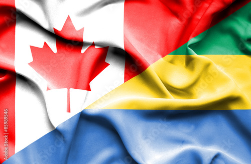 Waving flag of Gabon and Canada