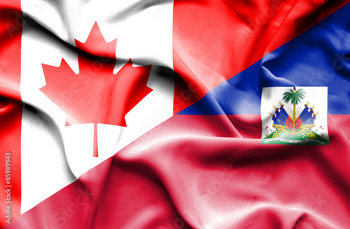 Waving flag of Haiti and Canada