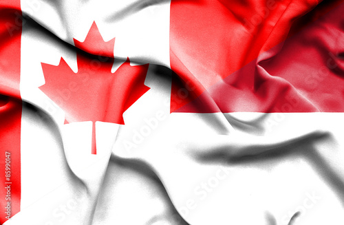 Waving flag of Indonesia and Canada