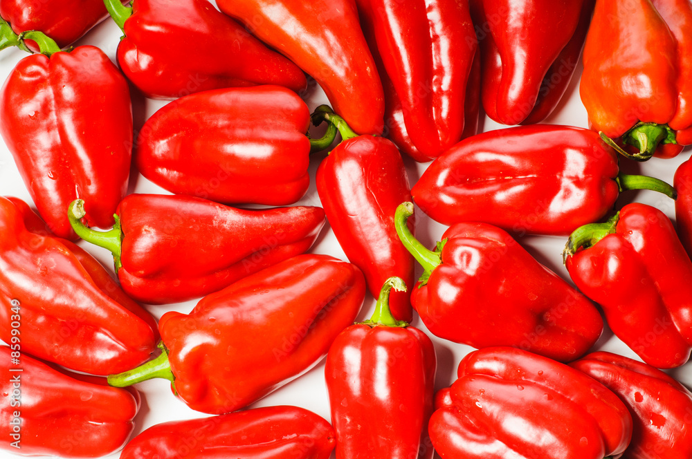 Red sweet peppers background