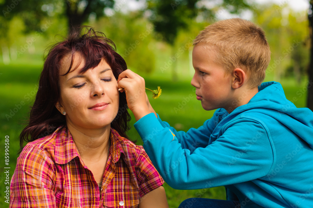 Mother and son outdoors