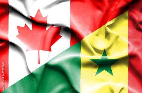 Waving flag of Senegal and Canada