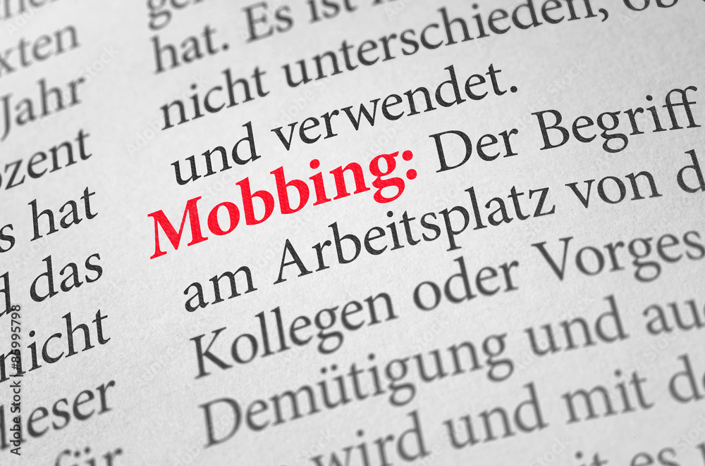 Obraz premium Wörterbuch mit dem Begriff Mobbing