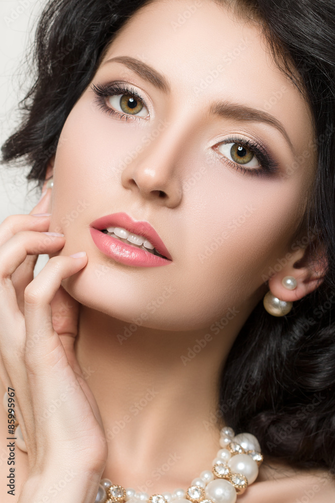 Close-up beauty portrait of young pretty brunette model
