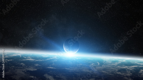 Fototapeta Naklejka Na Ścianę i Meble -  Sunrise over planet Earth in space