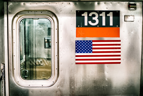 New York Subway train with american flag