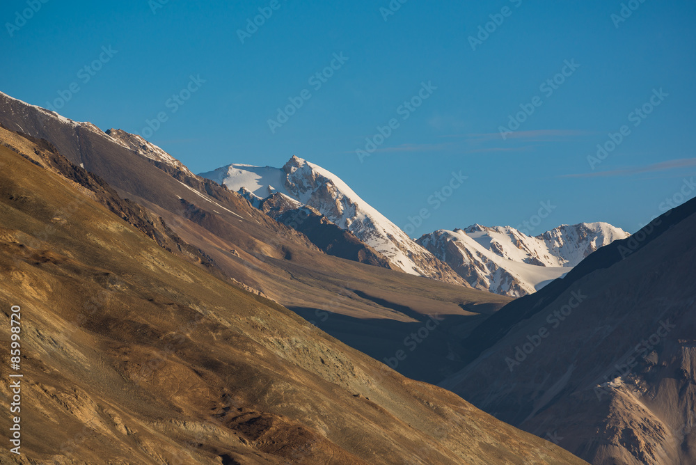 Mountain range at Pangong Lake.Light and shade from runrise.