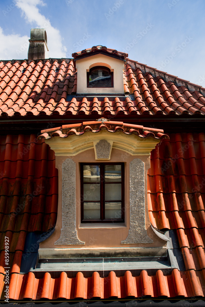 Windows on orange roofs in Prague, Czech Republic