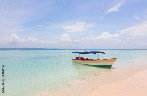 Boat on the beautiful tropical beach