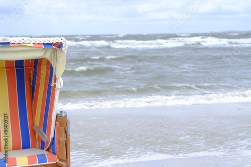 beach chairs on coastline